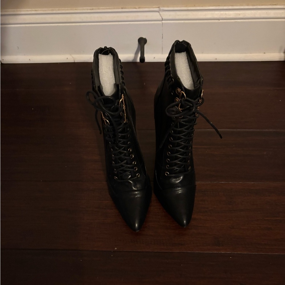 black stylish mini boots. Brand new, never been worn.